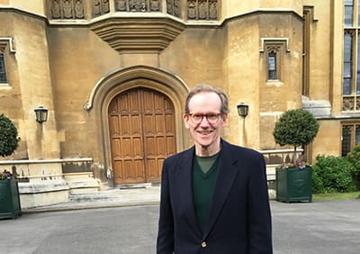 . Chester Johnson at the main entrance to Lambeth Palace, London, England
